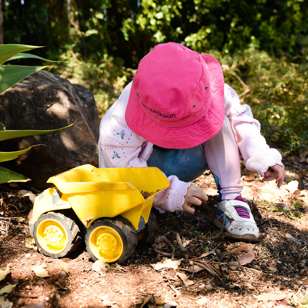 Child playing in a natural environment